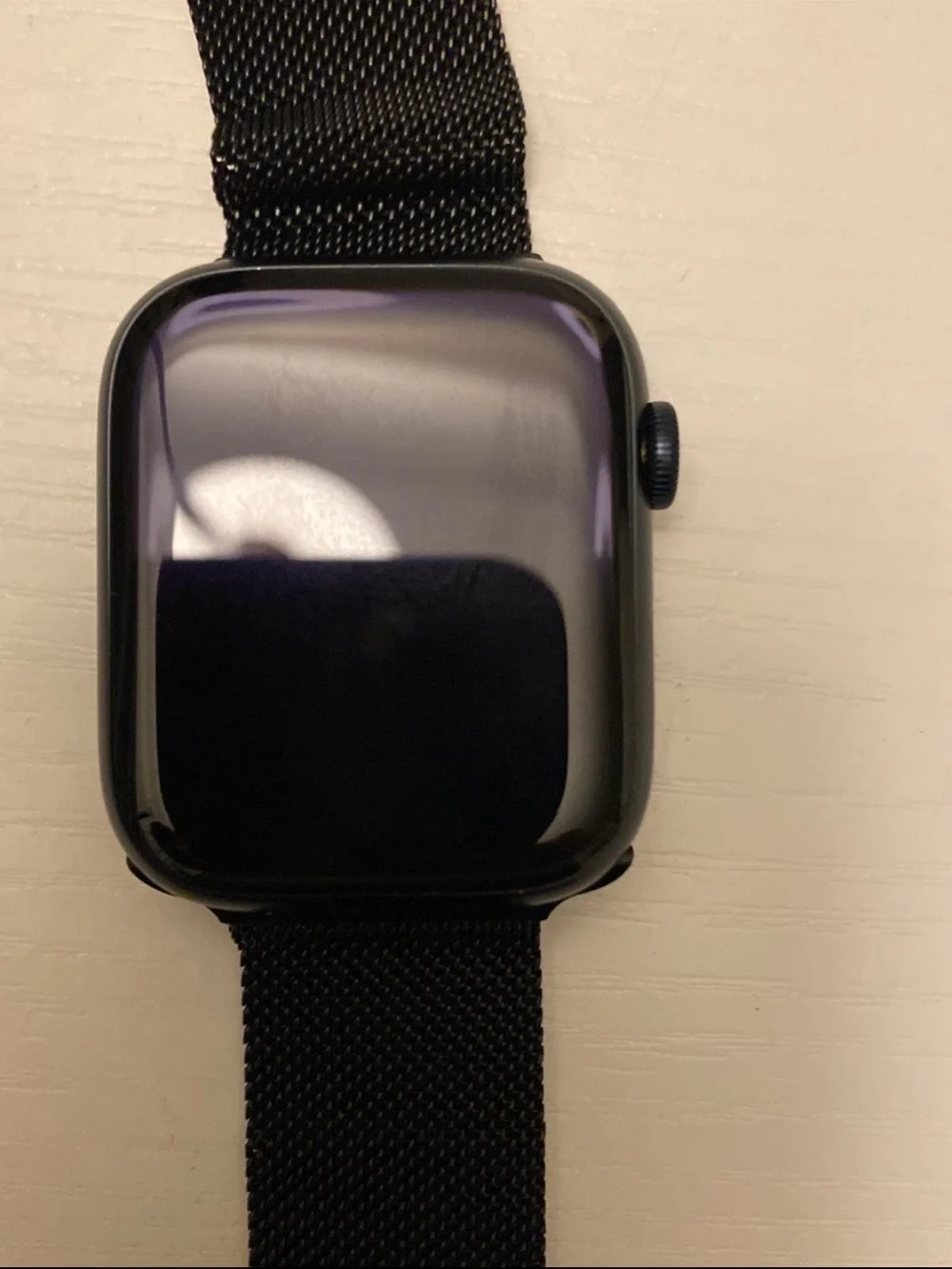 Apple Black Smartwatch with White Magnetic Charger